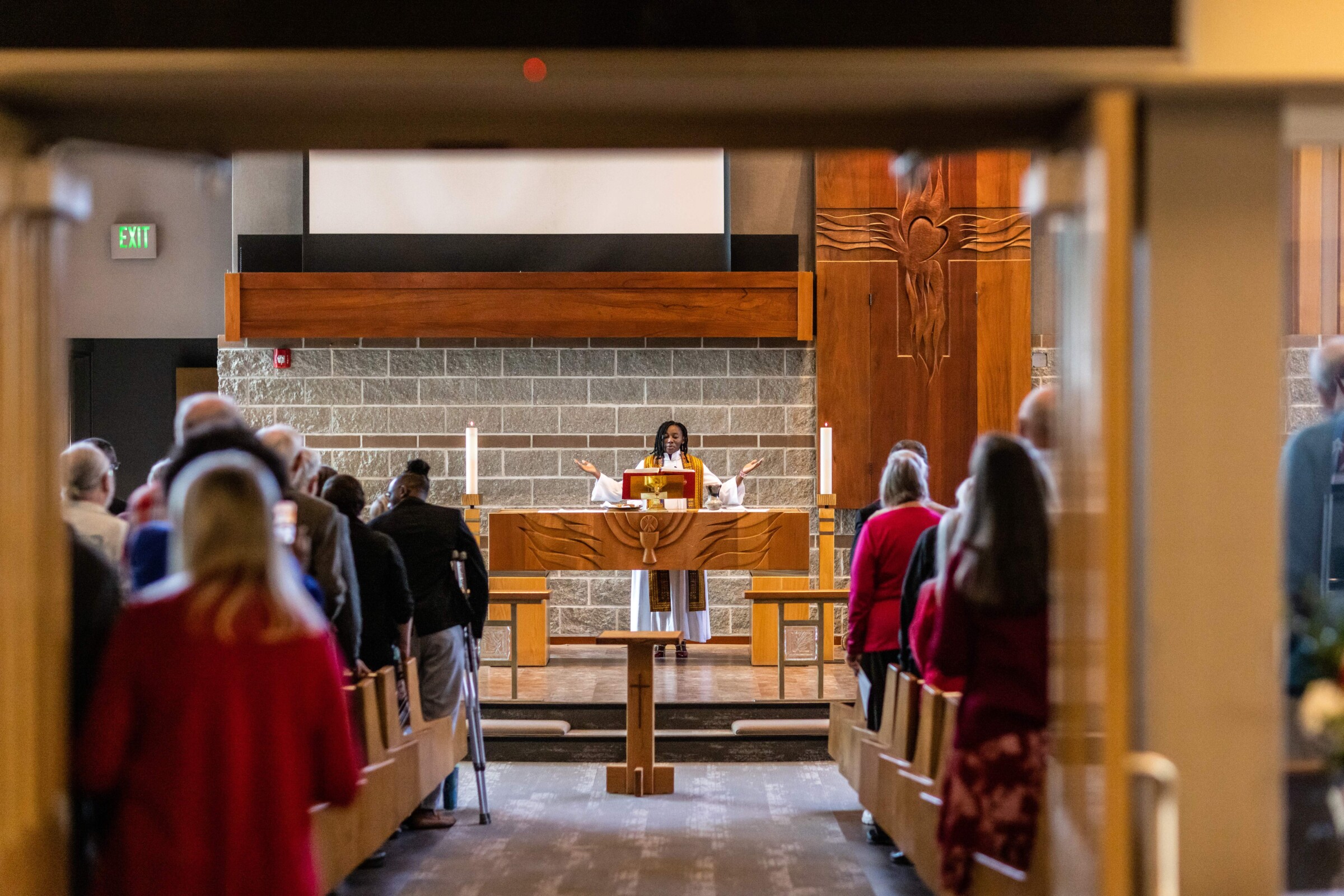 Emillie Binja presides over a service at a Lutheran Church.